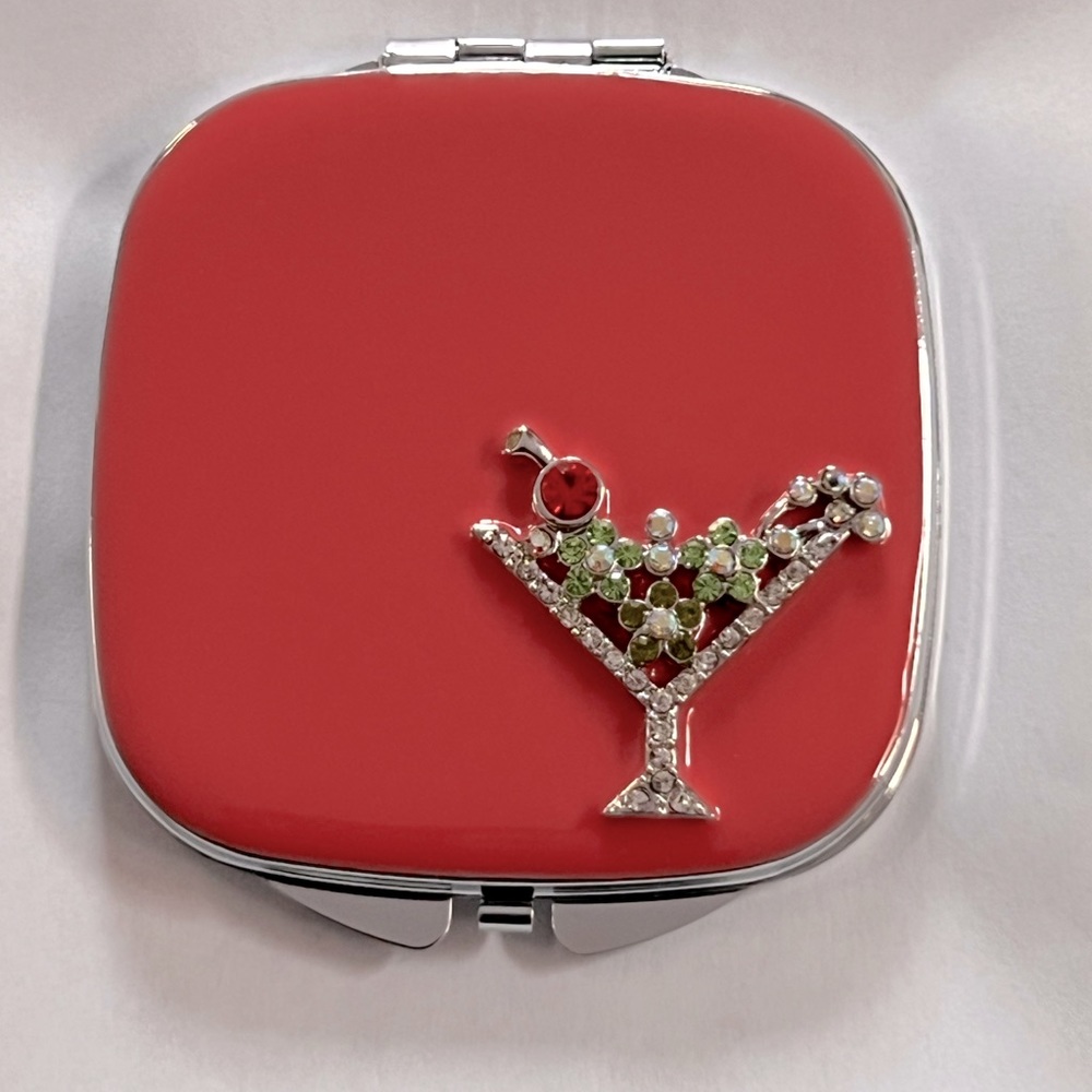 Spring Street pink jeweled double mirror compact.